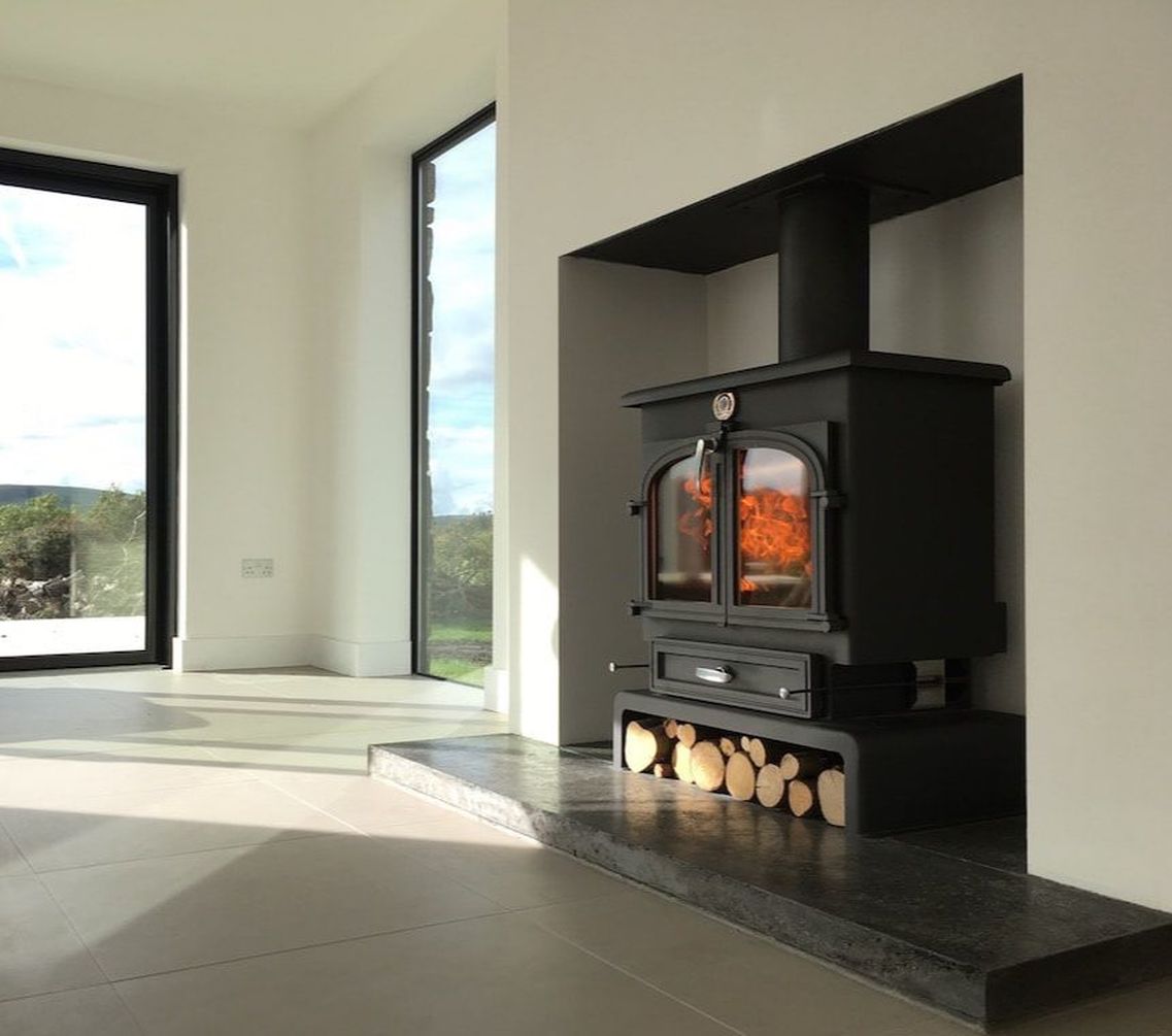 Polished concrete hearth made by concrete tuesdays with a clearview stove